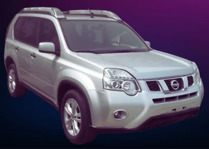 Nissan Xtrail T31 with a dark background.